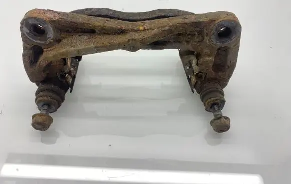 Subaru Legacy Front Brake Caliper Pad/Carrier 