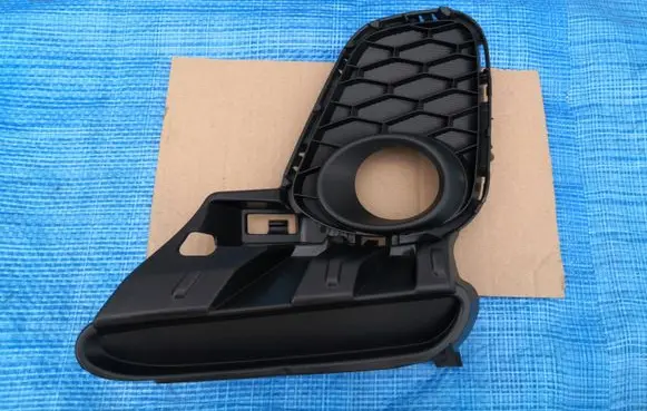 Mazda 3 II Front fog light trim/grill BGV450C21