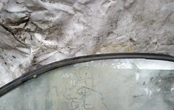 Mazda MX-3 Front door window glass four-door