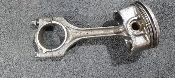Piston with connecting rod