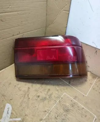Mitsubishi Lancer Rear/tail lights 0438560R