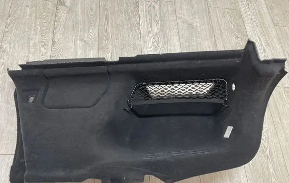 Trunk/boot lower side trim panel