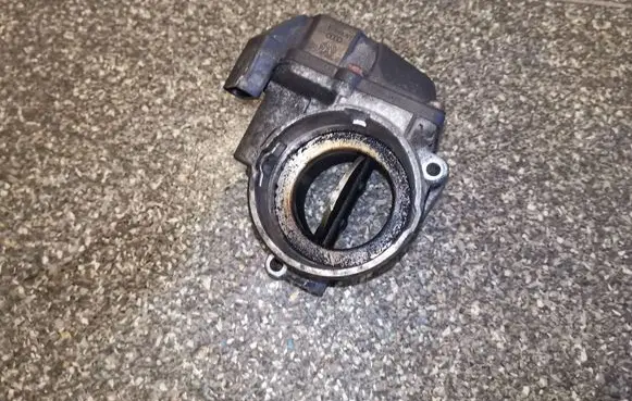 Volkswagen Touran I Throttle valve 03G128063A