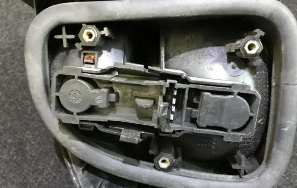 Renault Laguna I Tail light bulb cover holder