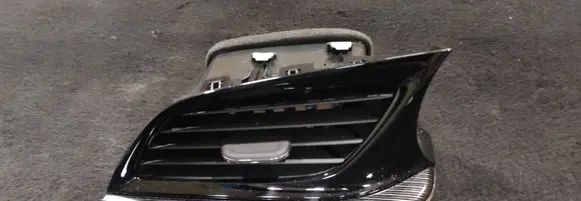 Dashboard side air vent grill/cover trim