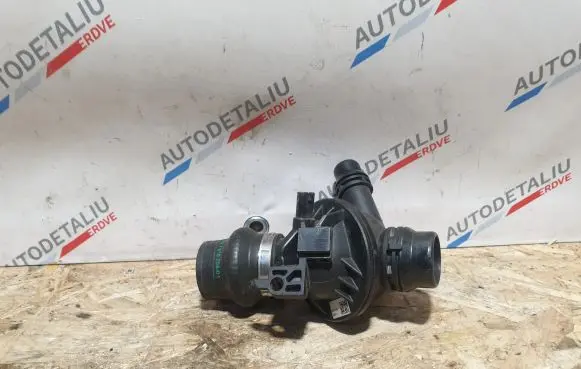 Thermostat/thermostat housing