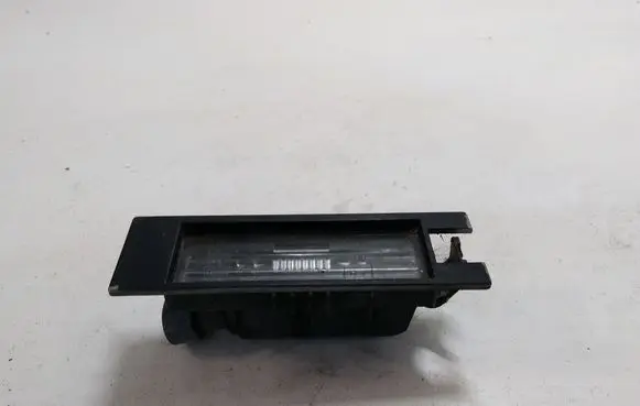 Opel Corsa D Number plate light 13139990