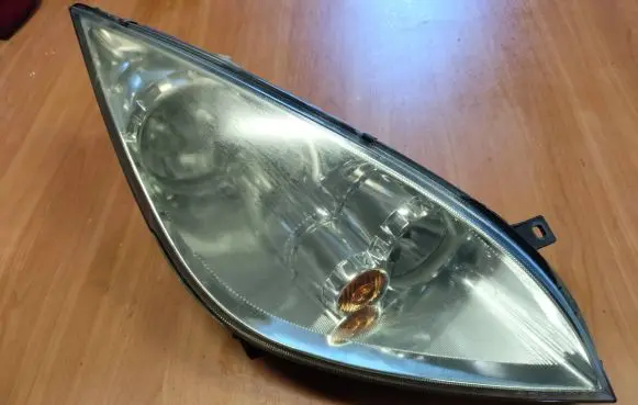 Mitsubishi Colt Headlight/headlamp MR957354 0301208202