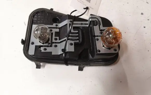 Volkswagen Touareg I Tail light bulb cover holder 7L6945257 28252102