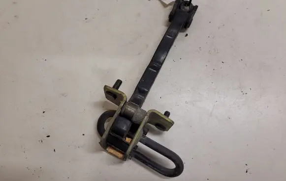 Volvo V50 Front door check strap stopper
