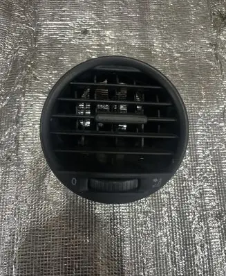 Volkswagen Caddy Dash center air vent grill 2K0819703B