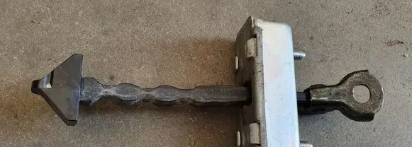 Mazda 6 Rear door check strap stopper