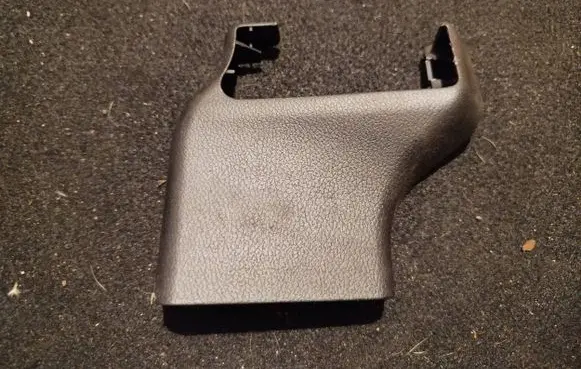 Mazda 3 II Front driver seat rail trim BBM257054