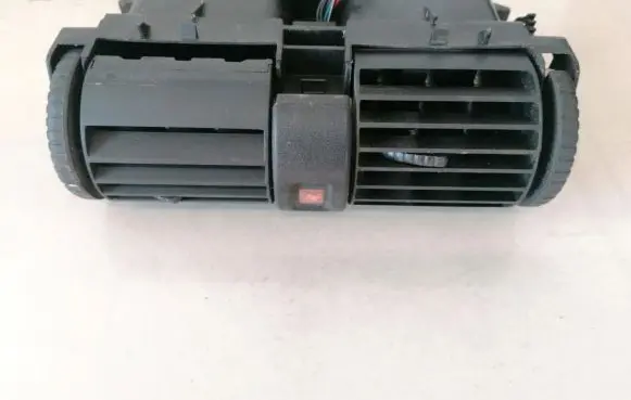 Opel Astra G Dash center air vent grill 90560344