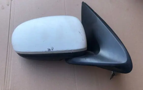 Nissan Almera N16 Front door electric wing mirror 