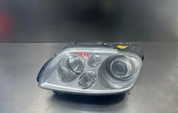 Volkswagen Touran I Headlight/headlamp 1T0941031K 14531455 0301205271