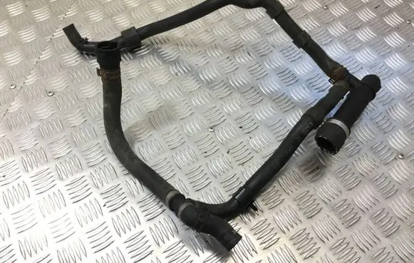 Volkswagen PASSAT B8 Engine coolant pipe/hose 5Q0121619D