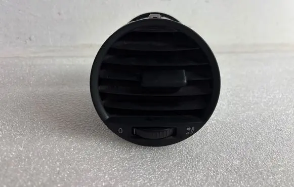 Volkswagen Caddy Dash center air vent grill 2K0819703B