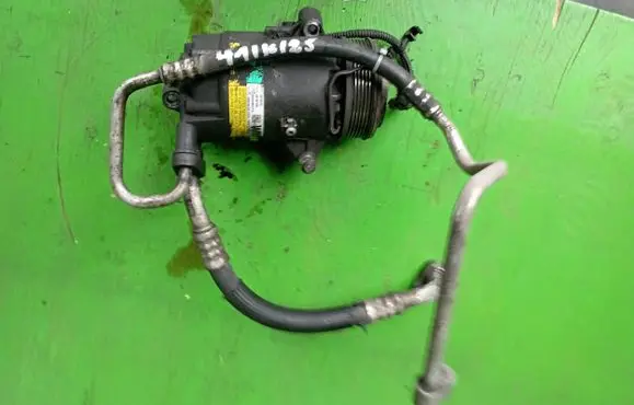 Opel Zafira B Air conditioning (A/C) compressor (pump) 13124752