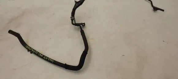 Volkswagen Golf VII Engine coolant pipe/hose 06K121075Q