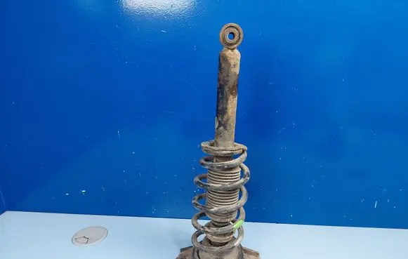 Nissan Primera Rear shock absorber with coil spring 5210AV400 67385