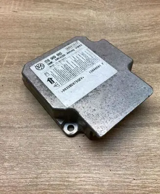 Volkswagen Touran I Airbag control unit/module 1T0909605