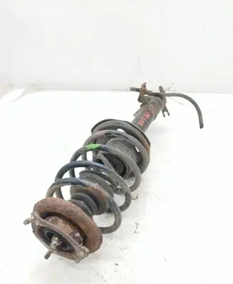 Nissan Almera N16 Front shock absorber with coil spring