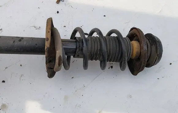Dacia Dokker Front shock absorber with coil spring 