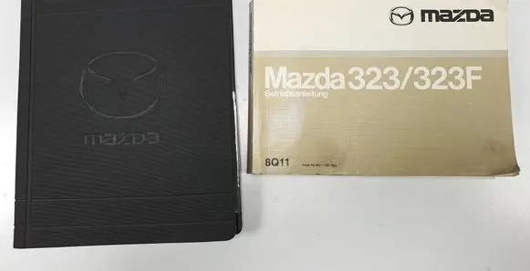 Mazda 323 F User manual 8Q11GE00J