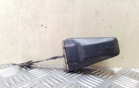 Front door check strap stopper
