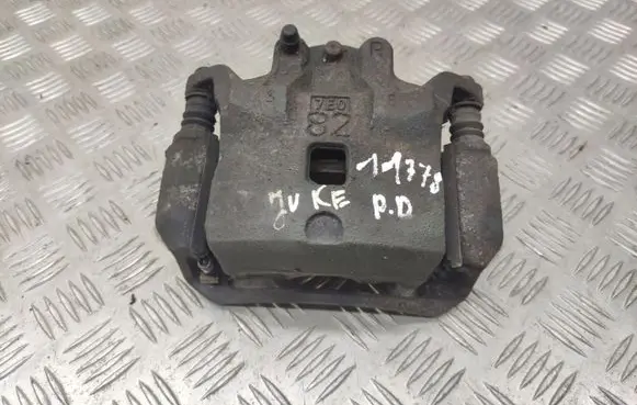 Nissan Juke I F15 Front brake caliper