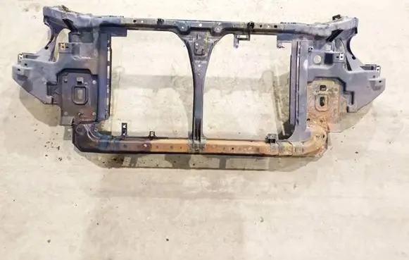 Radiator support slam panel