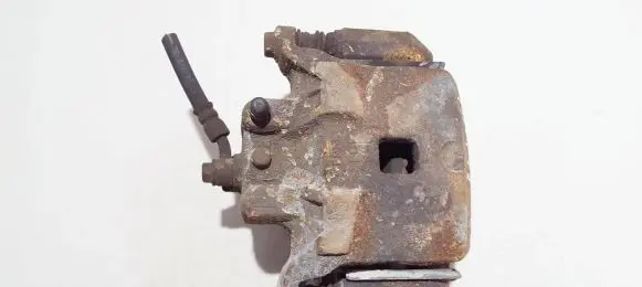 Nissan Juke I F15 Front brake caliper