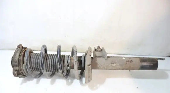 Seat Leon (1P) Front shock absorber with coil spring