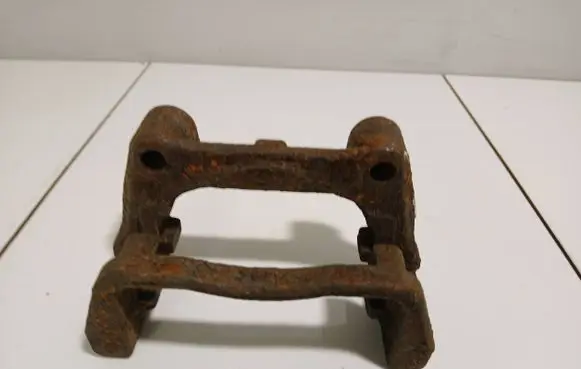 Opel Zafira B Brake caliper pad carrier rear 