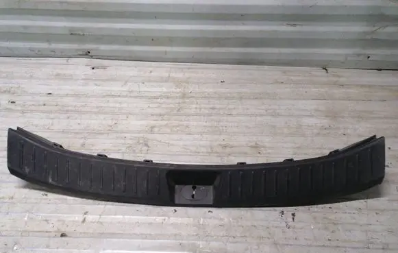 KIA Carens II Trunk/boot sill cover protection 857701D100
