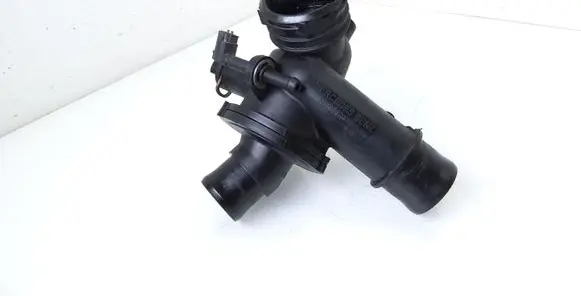 Thermostat/thermostat housing
