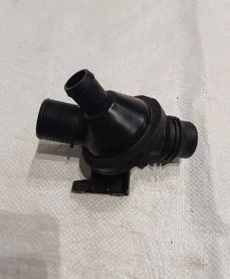 Thermostat/thermostat housing