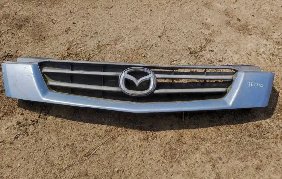 Mazda Demio Front grill DC3550712