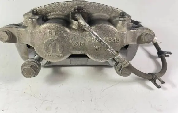 Ram 1500 Front brake caliper 68520813AA