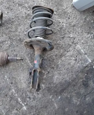 Toyota Avensis T270 Front shock absorber with coil spring