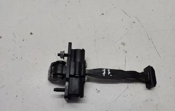 Front door check strap stopper