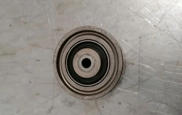 Timing belt tensioner pulley