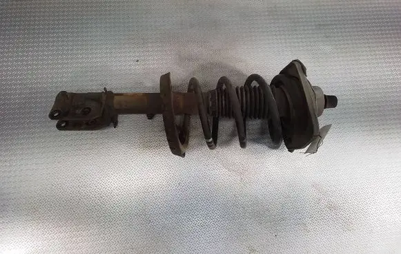 Front shock absorber with coil spring