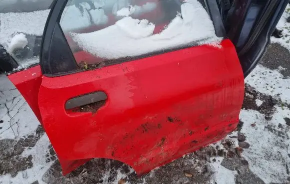 Mazda 121 SM Rear door