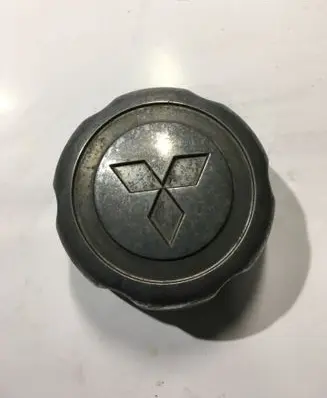 Mitsubishi Pajero Sport I Original wheel cap MB816581