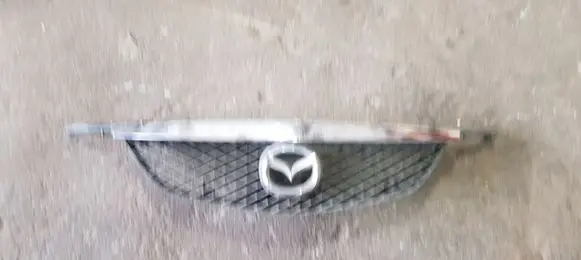 Mazda Premacy Front bumper upper radiator grill