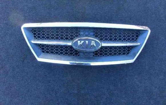 KIA Sorento Front bumper upper radiator grill 863503E010