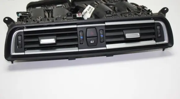 Dash center air vent grill