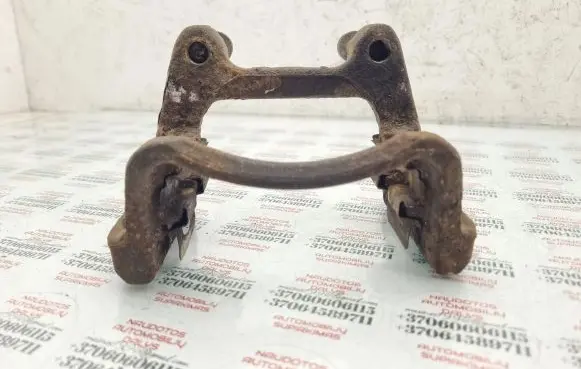 Volkswagen PASSAT B6 Brake caliper pad carrier rear 